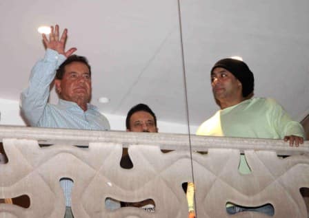 Bollywood screen writer Salim Khan with his son and actor Salman Khan waves towards his fans on occasion of Eid al-Fitr celebrations at his residence, in Mumbai, India on July 7, 2016. (Nikesh Gurav/ SOLARIS IMAGES)