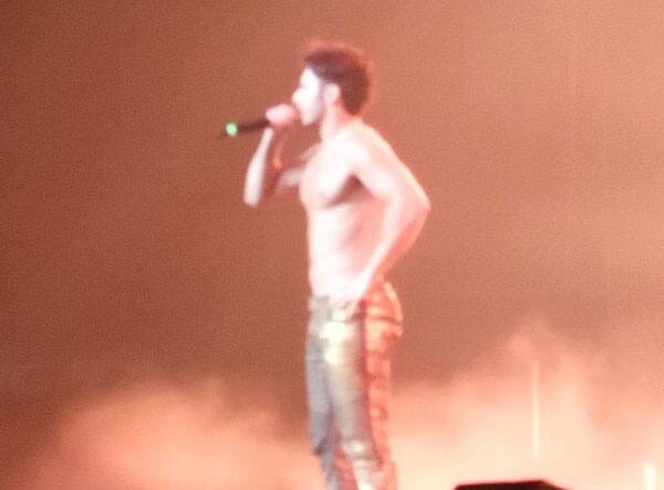 Varun Dhawan flaunts his hot body and killer abs on-stage