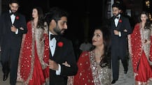 PHOTOS: Aishwarya Rai looks RAVISHING in red as she attends her stylist's WEDDING with hubby Abhishek Bachchan!