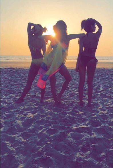 The gang of gals is having a gala time there. 