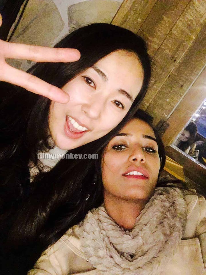 Poonam never fails to create controversy and she did it while meeting her friend in Korea too. See next pic!