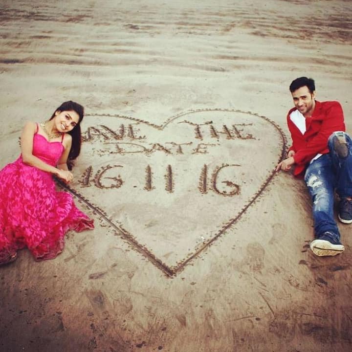 Here is an awesome picture the couple had posted few weeks before their wedding making an announcement on the beach in style