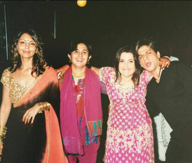 Another one with her very good friend Shah Rukh Khan and Gauri from their Wedding and she captioned it..
