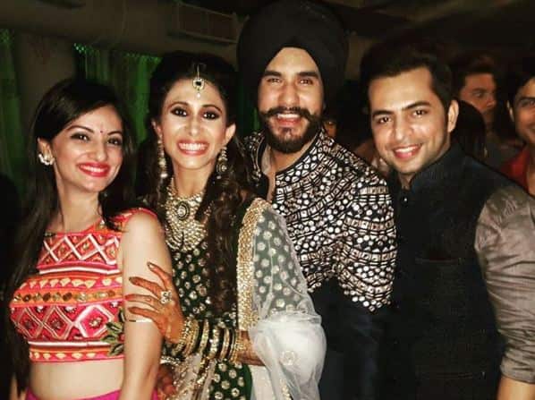The soon-to-be-married couple posing with actor Alok Narula and his wife. (Photo: Instagram)