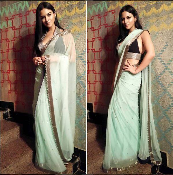 Priya looking stunning in her white Sari.