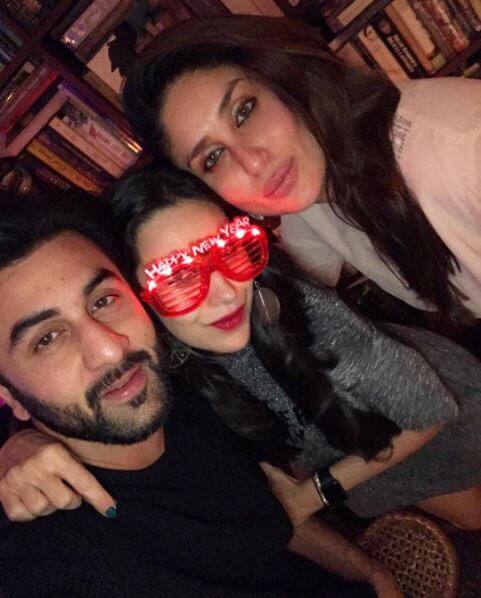 Here's a cute selfie of sisters Kareena & Karisma posing with Ranbir 