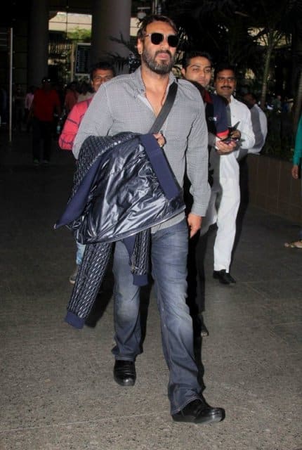 Bollywood actor Ajay Devgan arrive at the airport after the New Year celebrations in Mumbai, India on January 3, 2017. (Pravin Utturkar/ SOLARIS IMAGES)