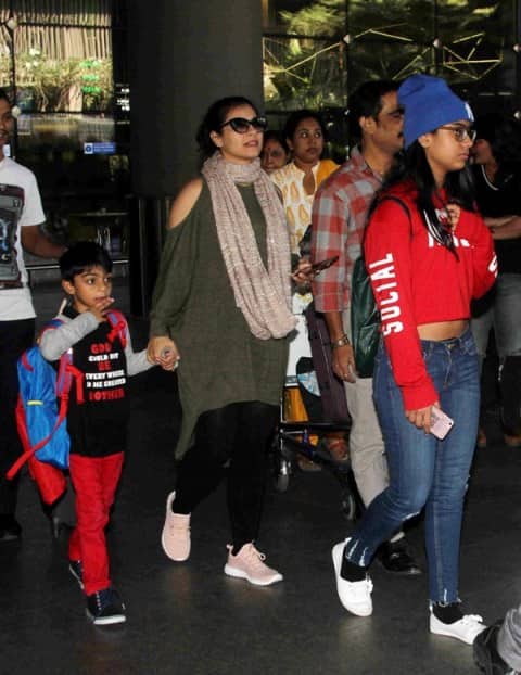 Kajol was spotted wearing a cold shoulder tunic top with leggings and scarf teamed up with white sneakers. Whereas Nysa sported a funky look wearing a cropped sweatshirt with ripped blue jeans. (Pravin Utturkar/ SOLARIS IMAGES)