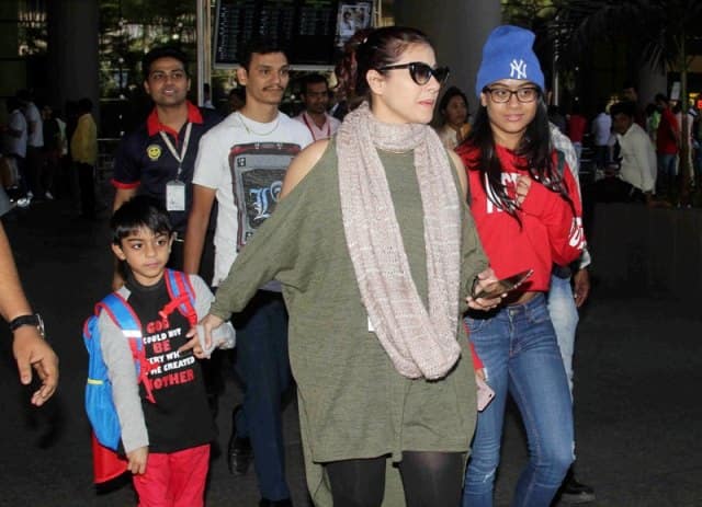 Bollywood actor Kajol with her son Yug Devgan and daughter Nysa Devgan arrive at the airport after the New Year celebrations in Mumbai, India on January 3, 2017. (Pravin Utturkar/ SOLARIS IMAGES)