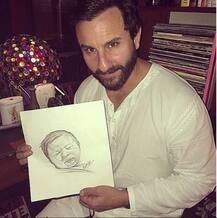 PHOTOS: This PIC of daddy Saif holding baby Taimur's SKETCH will melt your hearts !