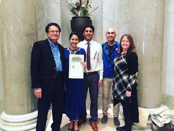 Newlywed Panchi & hubby posing with their marriage certificate