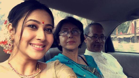 Here's Panchi posing with her mom & dad