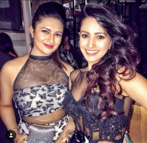 Divyanka wearing that sheer dress with a bustier and her hair tied back looks smoking while Anita like always stuns yet again with her style (Pic: Facebook)
