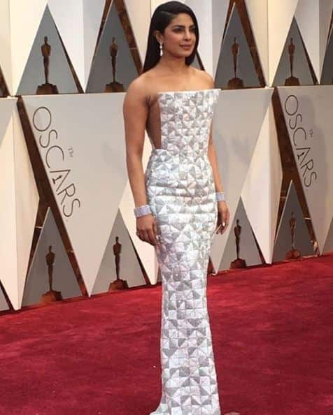 Priyanka Chopra chose a bold white dress for the occasion. The dress hugs her body and had a shield like front. She impressed everyone with her daring outfit.(Photo: Instagram/ bollywooddoze)