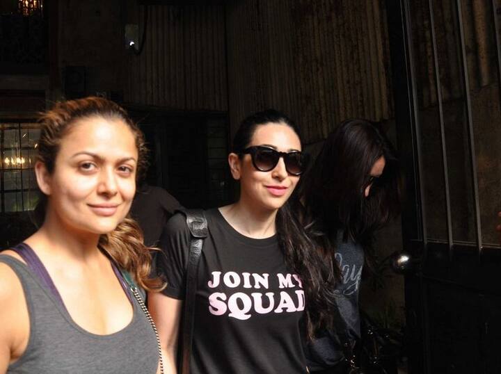 Amrita was snapped wearing a grey tank top with her hair tied in a loose ponytail. 