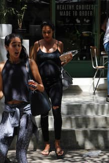 PICS: Heavily PREGNANT Lisa Haydon rocks her BABY BUMP on a day out with her GIRL GANG!