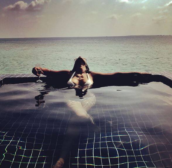 The actress posted another pic in her white bikini chilling like a boss and living up to her bold avatar
