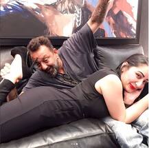 SEE PICS: Sanjay Dutt & wife Maanyata get ROMANTIC & COZY on the couch giving us a major relationship goal!