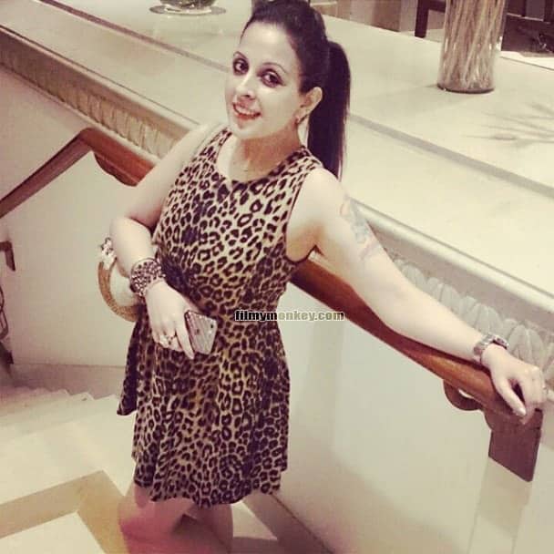 Here's vibha wearing a leopard print dress