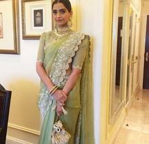 IN PICS: Fashionista Sonam Kapoor looks ETHEREAL in Sari as she attends the 64th National Film Awards with alleged boyfriend Anand Ahuja & father Anil Kapoor!