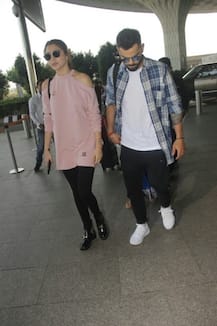 PHOTOS: LOVEBIRDS Anushka Sharma & Virat Kohli SPOTTED at Mumbai airport; Couple off for vacation!