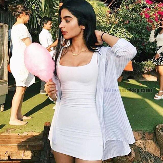 Here are some more pictures of Khushi...! Khushi looking gorgeous in white in a cleavage baring tight dress