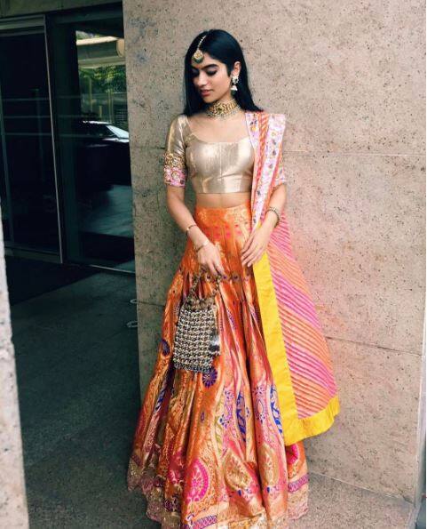 Khushi looking drop-dead-gorgeous in this bright lehenga at a wedding