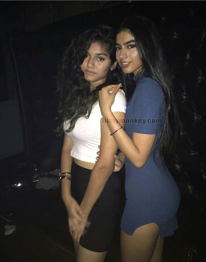 Hottie in a thigh high slit blue dress flaunting her figure