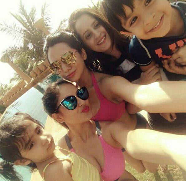 Awww! Adorable with the beautiful ladies & the cuties posing together