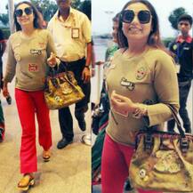 IN PICS: Stylish mommy Rani Mukerji & her super cute BABY GIRL Adira SNAPPED at Mumbai Airport!