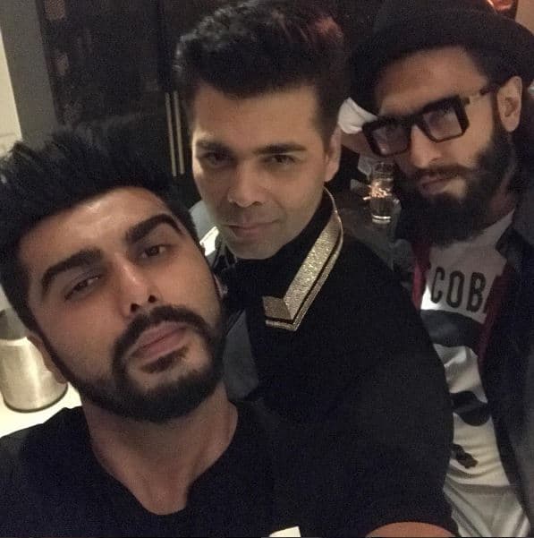 Karan Johar posted this picture with Arjun & Ranveer from the star-studded bash and captioned it as, 