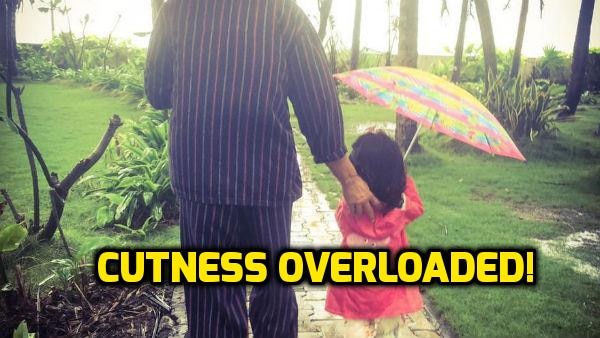 AWWDORABLE PIC: Akshay Kumar takes daughter Nitara out for a walk on a RAINY DAY! AWWDORABLE PIC: Akshay Kumar takes daughter Nitara out for a walk on a RAINY DAY!