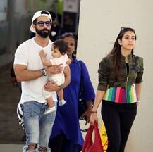 SEE PICS: Shahid Kapoor lands in New York with BABY MISHA wrapped in his arms & wife Mira to attend IIFA 2017