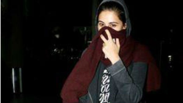 SEE PICS: Nargis Fakhri HIDES her face & surprises fans with her return! SEE PICS: Nargis Fakhri HIDES her face & surprises fans with her return!