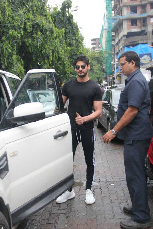 The upcoming Bollywood star happily posed for the photographers before leaving 