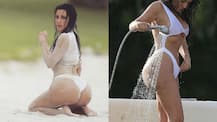 SEE PICS: Kim Kardashian flashes underb**b & her famous BUTT in a WHITE HOT SWIMSUIT!