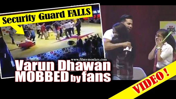 Varun Dhawan MOBBED by fans for Selfies; Chaos on stage during an event! WATCH VIDEO! Varun Dhawan MOBBED by fans for Selfies; Chaos on stage during an event! WATCH VIDEO!