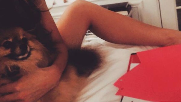 OMG! Actress poses naked in bed with her pet puppy ! OMG! Actress poses naked in bed with her pet puppy !