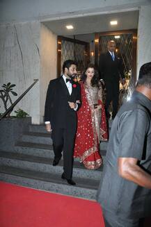 PHOTOS: Aishwarya Rai looks RAVISHING in red as she attends her stylist's WEDDING with hubby Abhishek Bachchan!