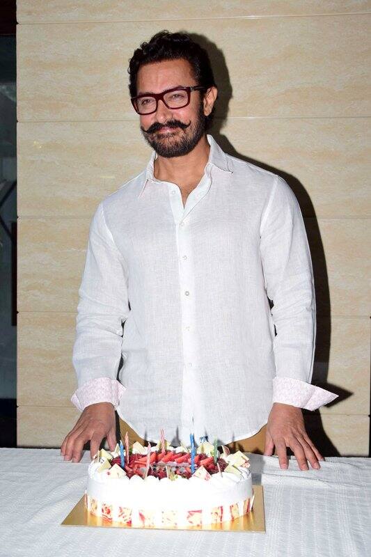 Bollywood superstar, Aamir Khan celebrated his 52nd birthday like he does every year, thanking the media for all the wish & support to him. The 'Dangal' star cut a beautiful cake presented to him by the media persons and also spoke at length to the press about his future endeavours . (Sanket Shinde/ SOLARIS IMAGES)