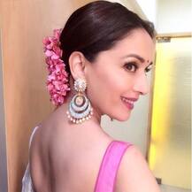 BEAUTY PERSONIFIED! IN PICS: Madhuri Dixit looks STUNNING as she attends her manager's WEDDING!