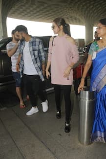 PHOTOS: LOVEBIRDS Anushka Sharma & Virat Kohli SPOTTED at Mumbai airport; Couple off for vacation!