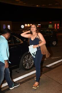 IN PICS: Yummy mummy Rani Mukerji spotted with BABY Adira at the Airport as they leave for Dubai!
