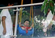 CHECK OUT: These FRESH PICS of Kareena's BABY TAIMUR enjoying on the SWING in balcony take CUTENESS to a whole new level!
