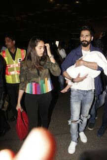 SEE PICS: Shahid Kapoor lands in New York with BABY MISHA wrapped in his arms & wife Mira to attend IIFA 2017