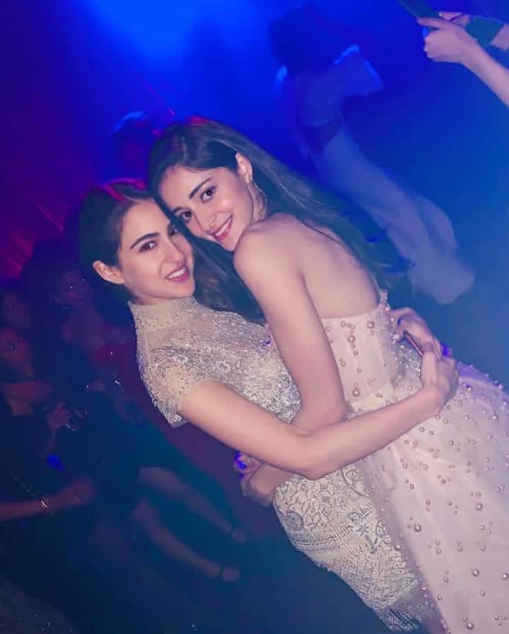Bollywood celebs party hard at Deepika-Ranveer's Reception party in Mumbai on Saturday night. 'Kedarnath' and 'Simmba' actress Sara Ali Khan hugs Ananya Panday who's making her debut with 'Student Of The Year'.