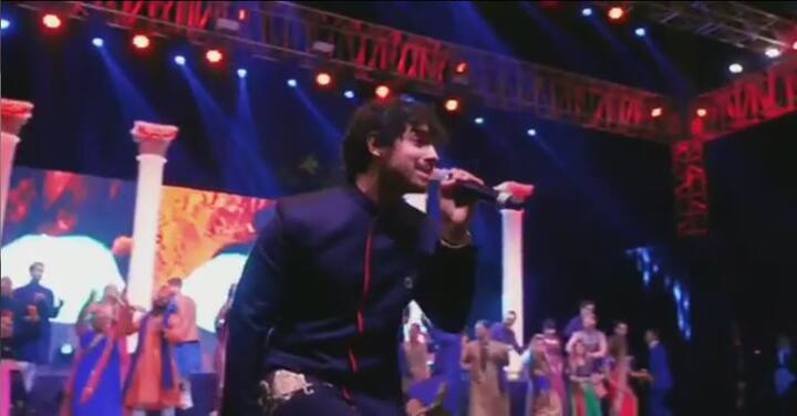 Nick's brother Joe Jonas sings at the sangeet ceremony. (Photo: Instagram)