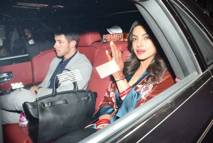 New bride PeeCee flaunted her 'chooda' & 'mehendi' as leaves Airport with hubby Nick Jonas. (Photo: Manav Manglani)