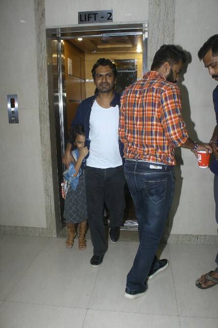 Shora was clicked with her father by Paparazzi at the screening but she was not really interested in getting clicked and these adorable pictures are a proof.(Photo: Manav Manglani)
