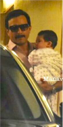 PICS: Taimur Ali Khan sleeps in Dad's arms as Saif & Kareena Kapoor leave for Switzerland!